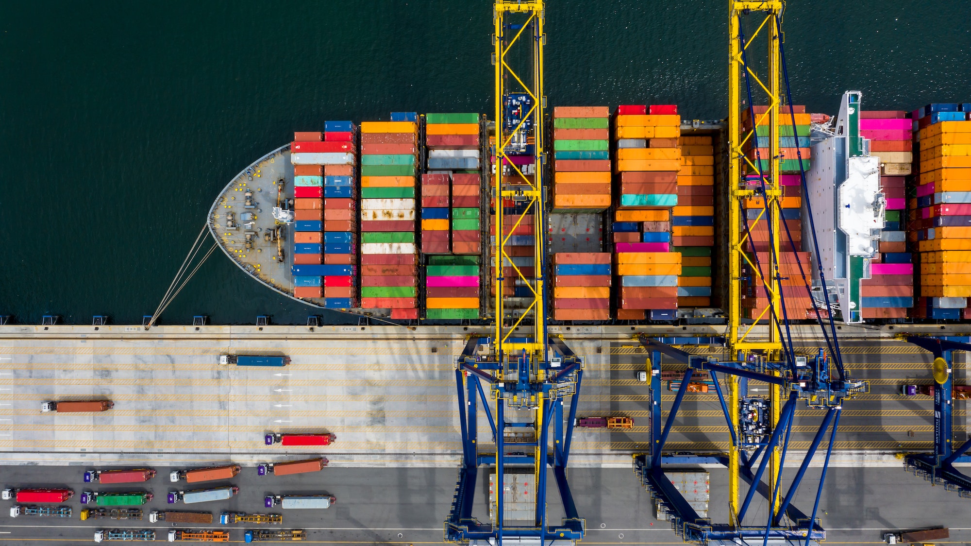 Aerial view container ship cargo freight shipping maritime vessel.